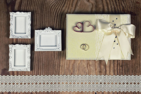 wedding ring invitation on a wood backgroundの写真素材