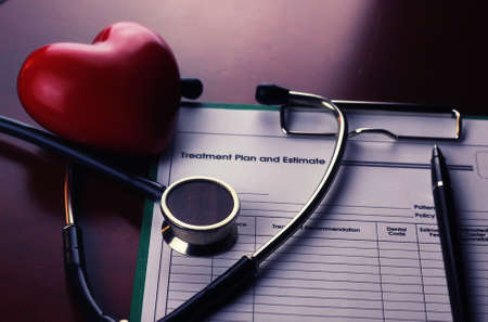 cardiologist stethoscope on paperの写真素材