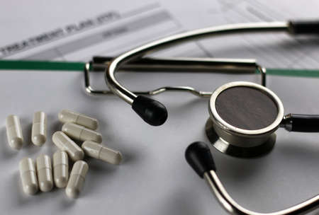 cardiologist stethoscope on paperの写真素材