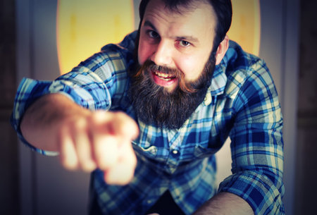 toned handsome man with beard macro portraitの写真素材