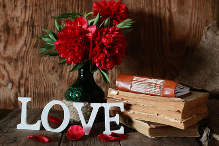 old books on  wooden tableの写真素材