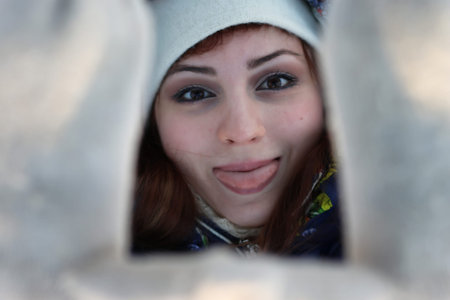 girl portrait in wiingter time hands hide