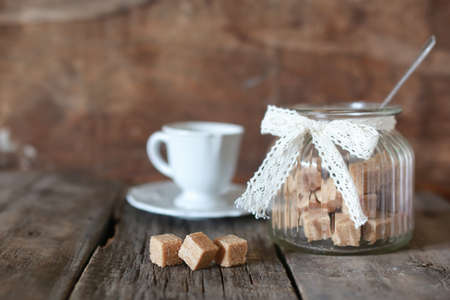 tea cup   on old wooden tableの写真素材