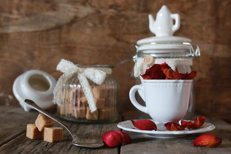 tea cup  on old wooden tableの写真素材