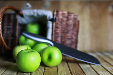 green apples  on  wooden backgroundの写真素材