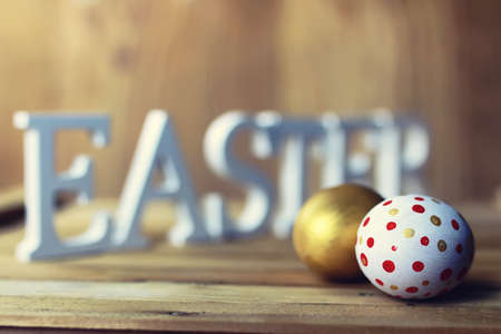 Easter eggs on wooden backgroundの写真素材