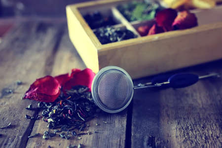 set of a different tea in a wooden boxの写真素材