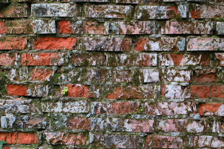 an old red brick wall backgroundの写真素材