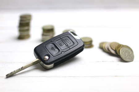 key and russian coins on white backgroundの写真素材