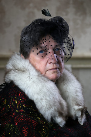 senior woman in a hat retro styledの写真素材