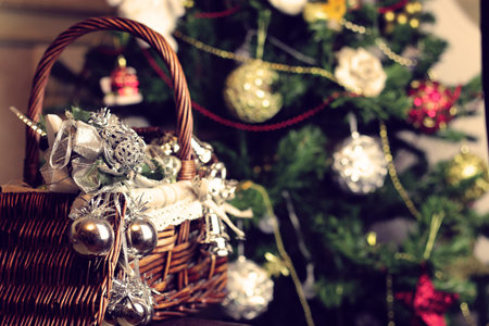 Christmas toys in a wicker basketの写真素材