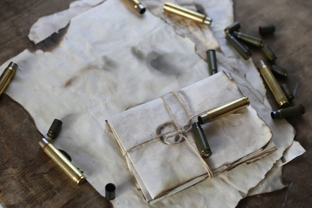 bullet and retro paper on the rustic table