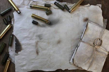 bullet and retro paper on the rustic table