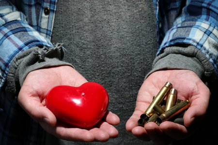 sleeves weapon in a hands of war victim