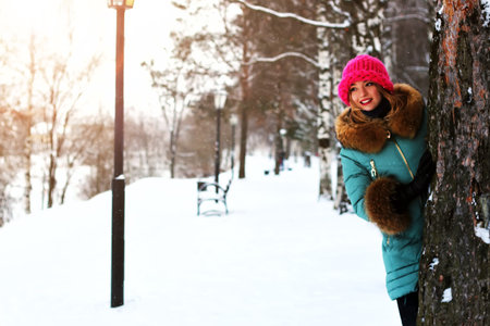girl adult portrait smile in a winter dayの写真素材