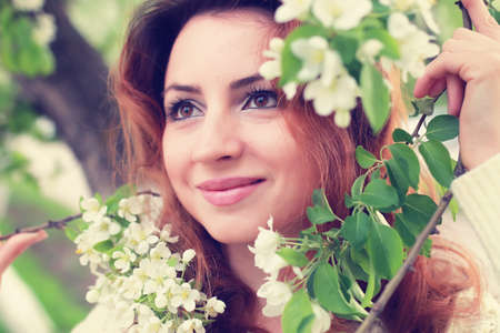 portrait of a happy young girl in springの写真素材