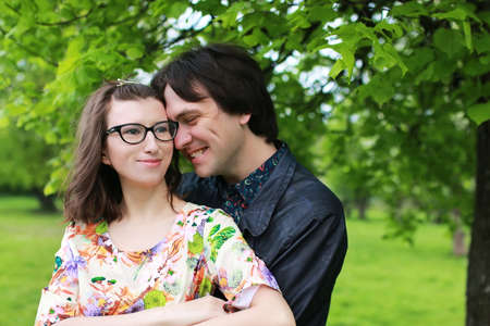 portrait of a happy young girl of European appearance with warm spring sunny dayの写真素材