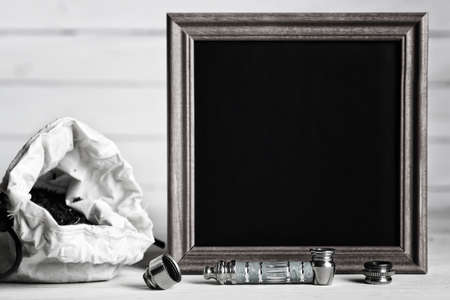 drug addiction concept bong for smoking marijuana and a bag on a wooden backgroundの写真素材