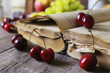retro wooden background book on the concept of reading old books as a way of lifeの写真素材