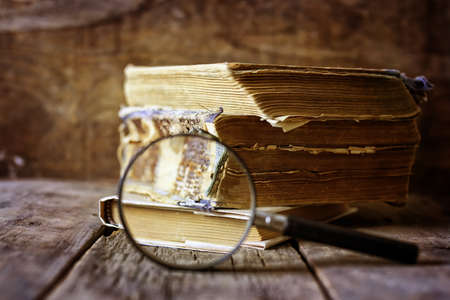 retro wooden background book on the concept of reading old books as a way of lifeの写真素材