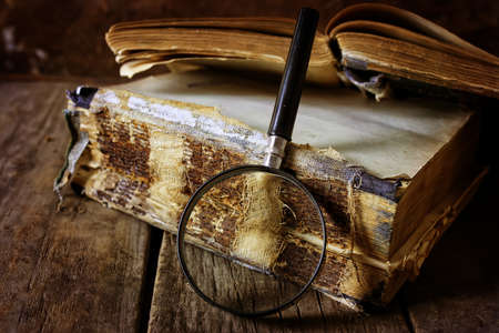 retro wooden background book on the concept of reading old books as a way of lifeの写真素材