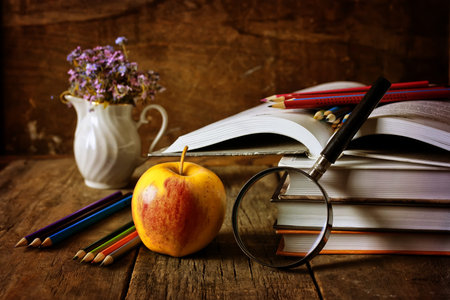 retro wooden background book on the concept of reading old books as a way of lifeの写真素材