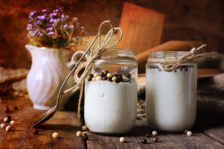 small jars with homemade food prepared at home with loveの写真素材