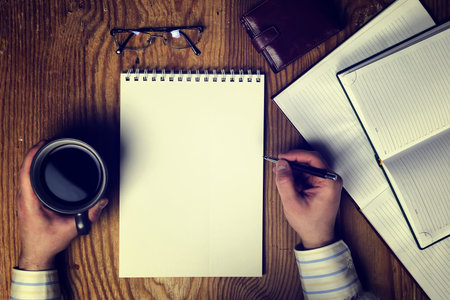 stationery workplace office employee with a cup of tea during lunchの写真素材