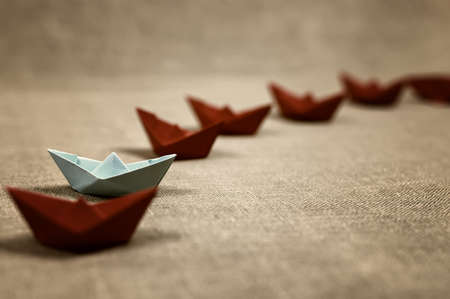 small colored paper folded boat, origami methodの写真素材