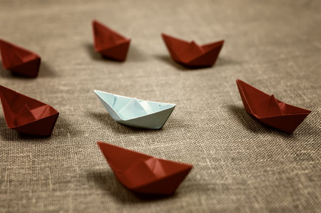small colored paper folded boat, origami methodの写真素材