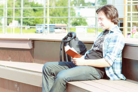 Portrait of a white student to rest while traveling on vacationの写真素材