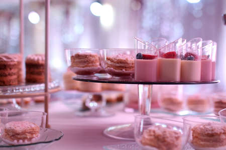 table setting in a restaurant preparing for the holiday instruments and sweetsの写真素材