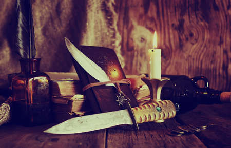 Vintage objects on old wooden shabby retro background conceptの写真素材