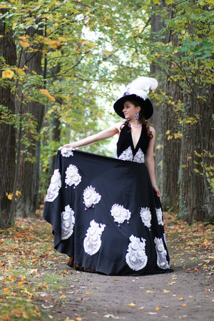 beautiful girl in Victorian dress in the manor summer day
