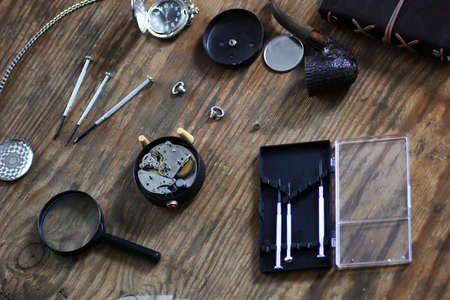 Workshop watch repair man in the course of workの写真素材