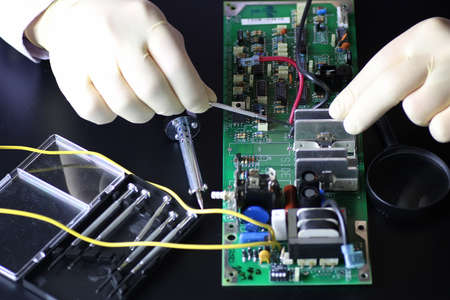Electronics repair fine on the desktop in the studioの写真素材