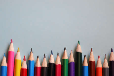 stationery on colored background set of pencils and various devicesの写真素材