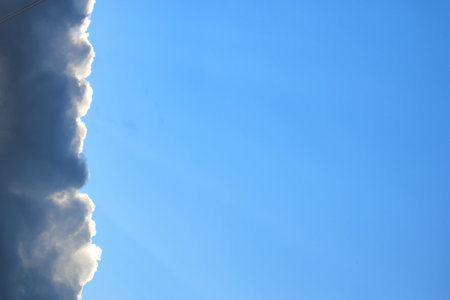 blue sky with rainy cloud on sunsetの写真素材