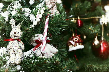 Multicolored Christmas ornaments made by dressing the Christmas tree for the new year