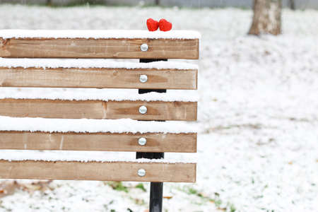 Snowy day shape of hearts red color in winter dayの写真素材