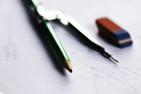 stationery and notebook on a table unfinished business in the workplaceの写真素材