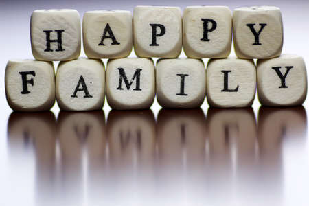 small white wooden blocks made up the word in the tableの写真素材