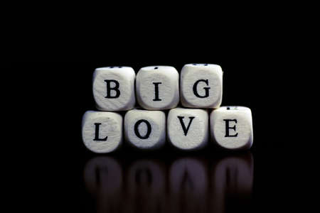 small white wooden blocks made up the word in the tableの写真素材