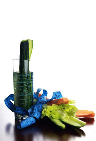 Fresh and juicy vegetables Diet in a transparent glass on the tableの写真素材