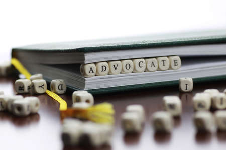small white wooden blocks made up the word in the tableの写真素材