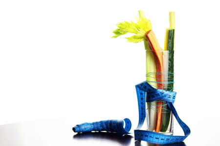 Fresh and juicy vegetables Diet in a transparent glass on the tableの写真素材