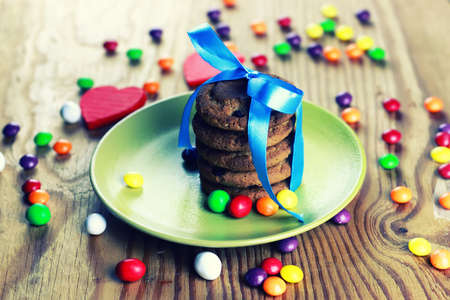 different homemade sweets on a light textural wooden tableの写真素材