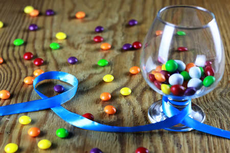different homemade sweets on a light textural wooden tableの写真素材