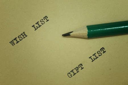 background sheet of yellowish paper with the printed words on a typewriterの写真素材