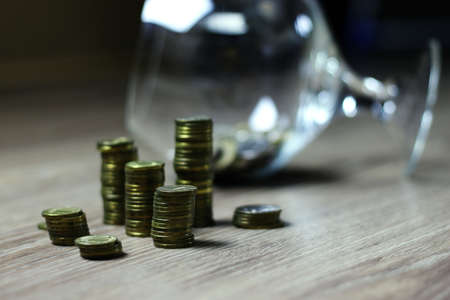 a lot of stacks of coins increasing yellow gradually the concept of progress and growthの写真素材